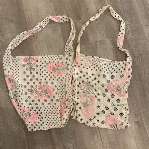 Sold! Set of Two Free people light weight logo tote cream black pink.